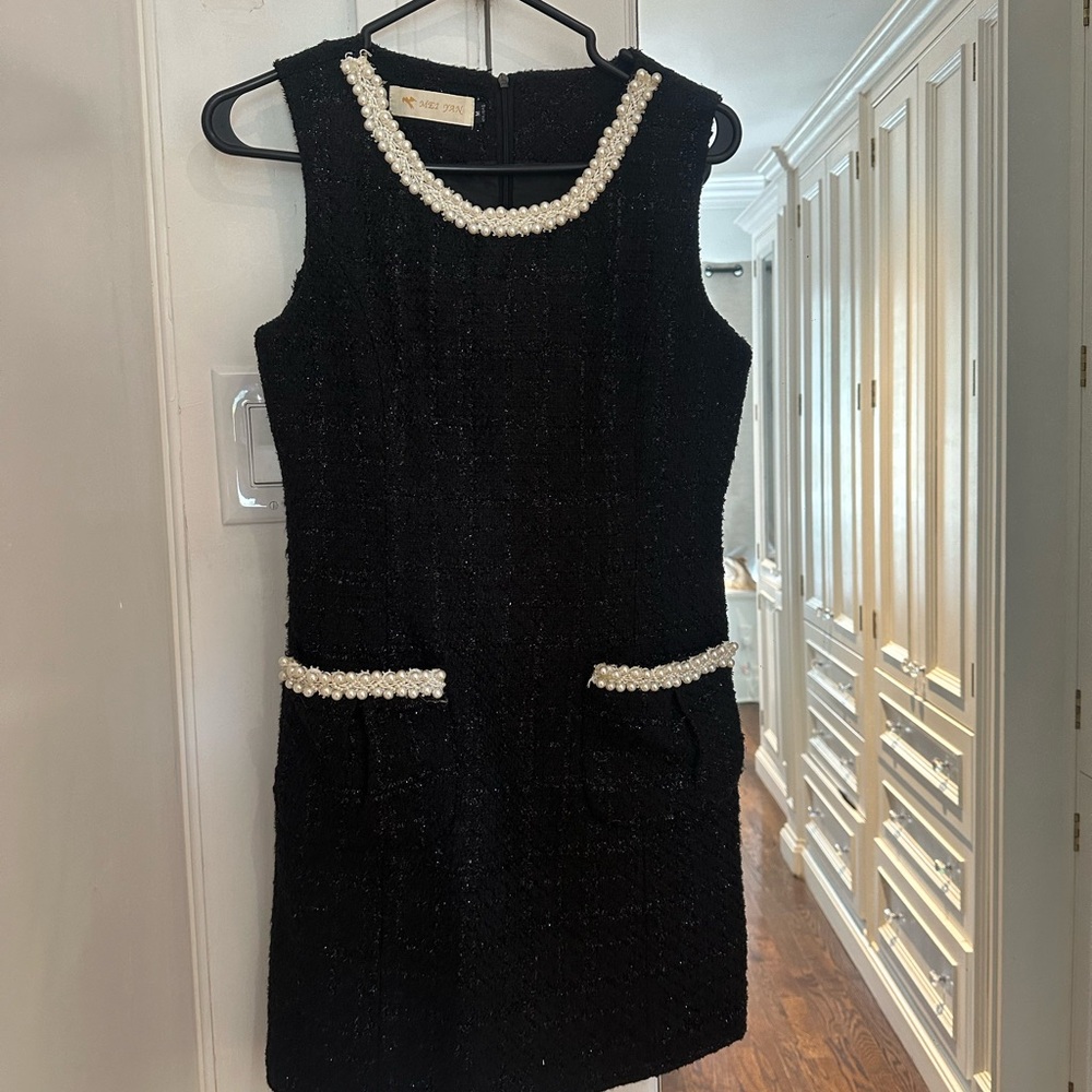 Chic Black Mini Dress with Pearl Trim
